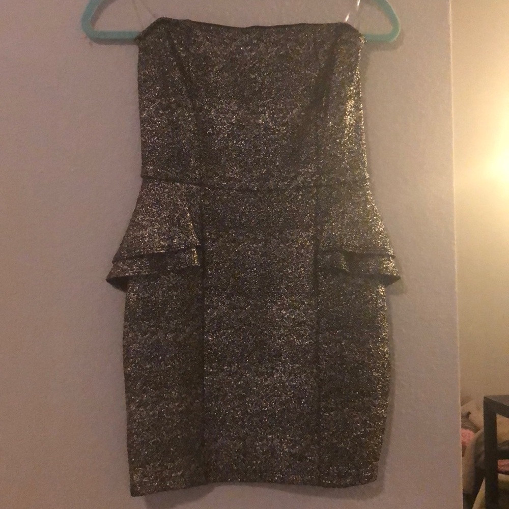 Gold and black peplum dress